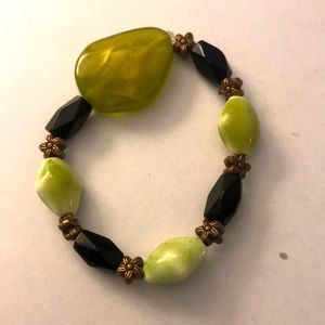 Green black and bronze stretchy beaded bracelet